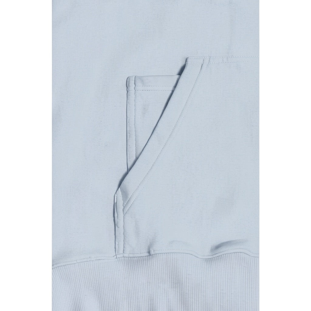 Close-up of the kangaroo pocket on a glacier grey cotton hoodie by wannabes* | Clothing Brand